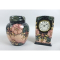 Two pieces Moorcroft Oberon pattern pottery, a ginger jar with lid, with an impressed jug date mark ... 