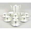 A Shelley Queen Anne shape 'Blue Iris' pattern tea set, comprising teapot, milk jug, sugar bowl, six... 