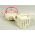 Two 19th century Belleek teapots, comprising a Tridacna tea kettle with pink coral decoration and fi... 