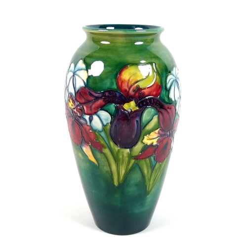 57 - A Moorcroft pottery vase, circa 1950s, of ovoid form decorated with the 'Orchid' pattern, bearing La... 
