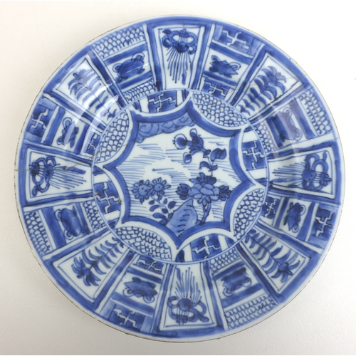 24 - Three pieces of 19th century Delft blue and white ceramics, a later 19th century charger with a rive... 