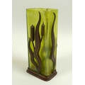 An Art Nouveau iridescent green glass and metal vase, in the style of Loetz, the rectangular section... 