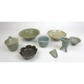 A group of Chinese 18th century and later celadon wares, including a crackle glazed bowl with unglaz... 