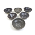 Six Chinese stoneware shipwreck tea bowls, possibly from the Ka Mau wreck, with dark brown glaze, So... 