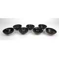 Seven Chinese stoneware shipwreck tea bowls, possibly from the Ka Mau wreck, with dark brown glaze, ... 