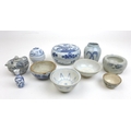 A collection of Chinese and Vietnamese porcelain and ceramics, including a circular form blue and wh... 