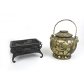 A 19th century Chinese bronze incense burner, of rectangular form decorated with a greek pattern bor... 