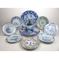 A group of 19th century Japanese porcelain and stoneware, including two blue and white chargers, one... 
