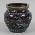 A 19th century Chinese cloisonne vase, depicting a brightly coloured bird in flight, further with bu... 