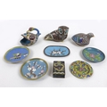 A group of eight pieces of cloisonne, comprising an angler fish/swan brush pot 12cm long, five pin t... 
