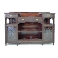 A Gothic Revival mahogany sideboard, by Edwards & Roberts, circa 1890, with blind carved decoration,... 