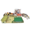 A quantity of toys including a Binbak farmyard, 62.5 by 37 by 12.3cm high,  with animals, including ... 