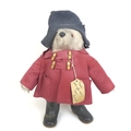 A 1970s Paddington Bear soft toy, by Gabrielle Designs with hat duffel coat and label, 50cm high (in... 