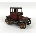 A vintage Schuco Ford Coupe T 1917, model 1227, with lithographed tin plate body, clockwork.