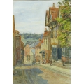 Henry Sheppard Dale (1852-1921): a West country hillside town scene with Tudor buildings, with the D... 