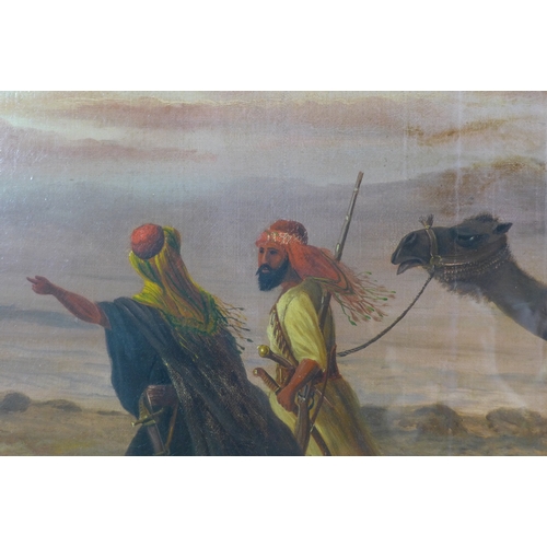 265 - Howard M Hunt (British, 19th century): a nomadic tribe journeying through the desert, with a woman a... 