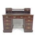 An Edwardian mahogany desk, fitted gallery, inset surface, twin pedestals with a series of drawers, ... 