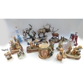 A group of ceramic figurines, including Royal Doulton Princess Diana, Elizabeth II, some Border Fine... 
