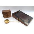 A 19th century writing slope, with secret drawer, brass fittings a/f, together with a jewellery puzz... 