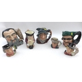A group of six Royal Doulton character jugs, comprising Dick Turpin D 6528, Merlin D 6529, Rip Van W... 