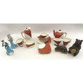 A Royal Doulton De Luxe part tea set with two Staffordshire figurines, and two pieces of Black Fores... 