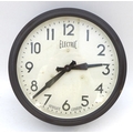 A reproduction Electric Newgate London circular wall clock, battery powered.
