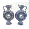 A pair of 19th century German Weserwald salt glazed moon flask ewers, with single handle, loop to an... 