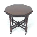 A Victorian mahogany occasional table, octagonal surface.