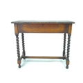 An early 20th century oak desk / side table, with flip open top with fitted interior, barley twist l... 
