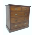 A 19th century American walnut chest of drawers, with two over three drawers, raised upon castors.