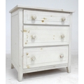 A modern pine white painted chest of drawers and matching chest. (2)