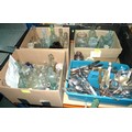 A collection of vintage glass bottles and silver plated flatware, including bottles for Eiffel Tower... 