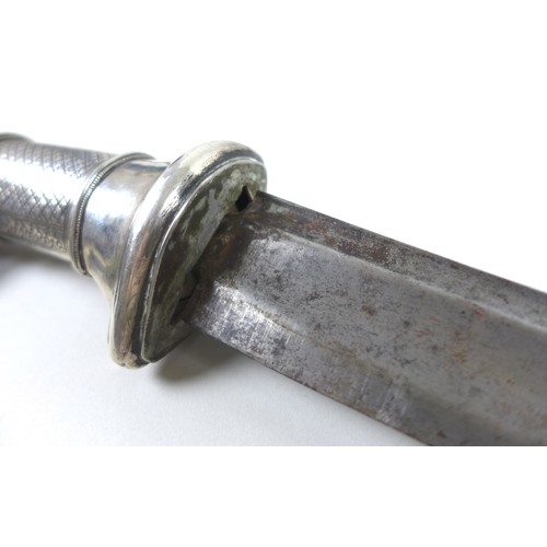 137 - A 19th century white metal and horn handled sword, likely an Indonesian parang or pedang, with silve... 