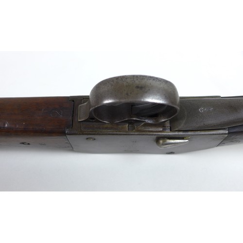 136 - A Victorian Martini Henry carbine, with broad arrow stamped on its stock as well as to its barrel, a... 