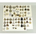 A collection of sixty eight British military badges, including Kings Royal Rifle Corps, Northamptons... 