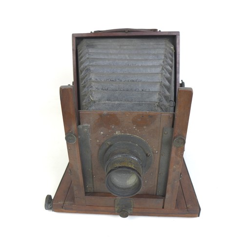 71 - A Victorian wooden plate camera, apparently unmarked, together with a mahogany case containing a set... 