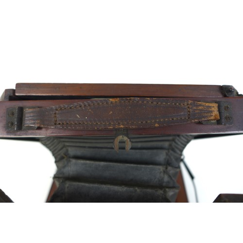 71 - A Victorian wooden plate camera, apparently unmarked, together with a mahogany case containing a set... 