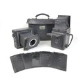 A Thornton-Pickard Victory Reflex camera, together with a further unnamed camera, a/f, with case and... 