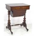 An Victorian walnut sewing table, with single drawer and sliding base, includes some sewing accessor... 