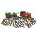 A collection of die-cast metal cars and tin plate toys, including a 1960s tinplate Europa Cup Footba... 