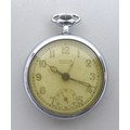 A post WWII Mentor top wind pocket watch with alarm, Brevet 227383, white metal case.
