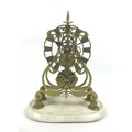A 19th century brass skeleton clock with fusee movement, on marble base with pendulum and key, unsig... 
