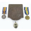 A WWI 9ct gold double-sided photograph pendant believed to be of C-12873 Private Percy Everingham an... 