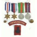 A group of four WWII medals, France and Germany star, 1939-1945 star, Defence medal, 1939-1945 medal... 