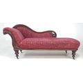 A late Victorian mahogany chaise longue, floral carved frame, upholstered in red and gold coloured f... 