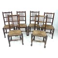 An harlequin set of six 19th century oak Lancashire spindle back country dining chairs, with two row... 