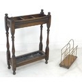 A mid 20th century brass and mahogany magazine rack, together with an Edwardian oak three division u... 