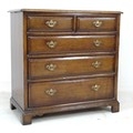 A modern stained oak chest of drawers by Titchmarsh & Goodwin, in Georgian style, the two over three... 