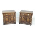 A pair of modern stained oak bedside cabinets by Titchmarsh & Goodwin, in Georgian style, each with ... 