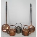 A group of copper items, comprising two kettles and two bed warming pans, together with a large stee... 